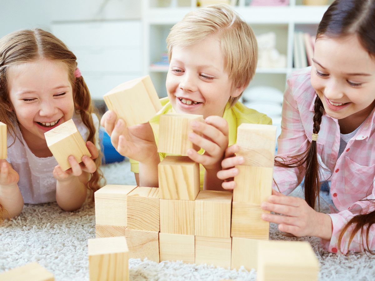 children playing blocks with fairness and respect